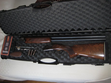 hola vendo escopeta superpuesta Beretta 682 gold sporting calibre 12 tiene cañones de 75 cms de largo 22