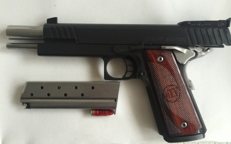 VENDIDA ,,,,,pistola STI targert master de 6 pavon  de 9mm tiene un año  ,la compre nueva ,esta practicamente 21