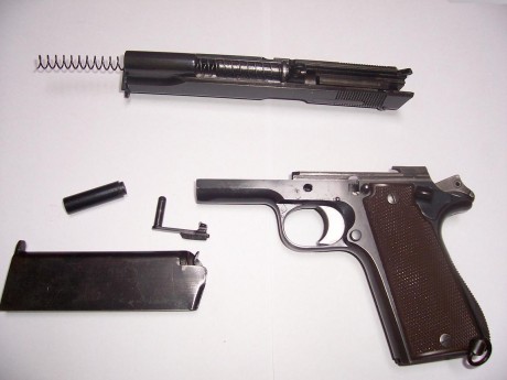 Para Oscar1975 y para todo el que le interese, voy a poner un tutorial del desmontaje de una pistola tipo 50