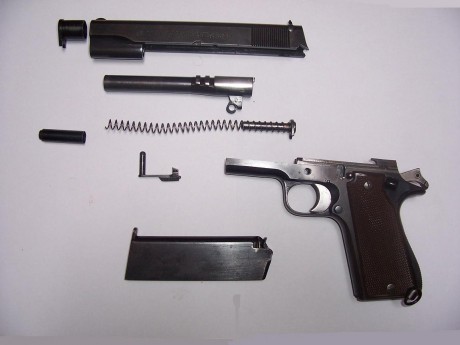 Para Oscar1975 y para todo el que le interese, voy a poner un tutorial del desmontaje de una pistola tipo 70