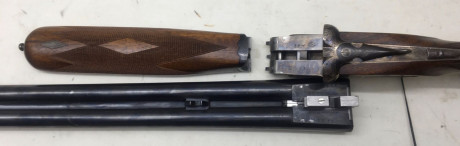 Marca Arrieta, cal 12, culata pistolet, delantera cola castor, cañones 68 cm de 4× el derecho  y 2 × el 02