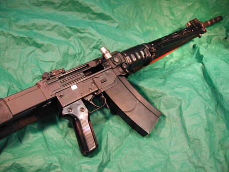 Se venden armas de este tipo po Europa en semi y son del calibre 7,55x55, por lo tanto se podrian guiar 00