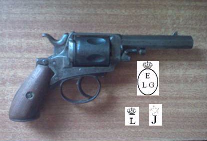 Solicito vuestra ayuda para identificar este revólver.Adjunto foto del mismo,asi cono de las marcas que 00