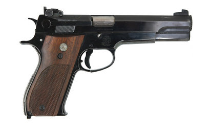 Un amigo y yo tenemos dos S&W Master 52, en la parte izquierda de la corredera hay la siguiente inscripcion 92