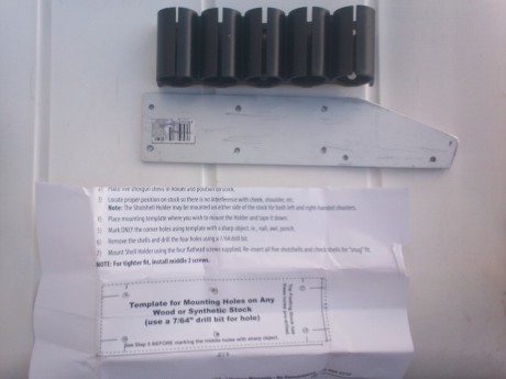 lo he copiado de videos que he visto  en youtube  sobre la instalacion de portacartuchos tactico en una 00
