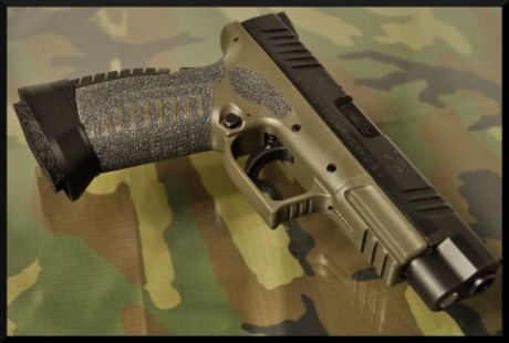 Me gustan mucho la XDM, por eso he pensado en poneros una fotos de esta nueva serie:

Specifications 	
Caliber 130