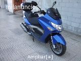 hola es una  scooter kymco xciting 500 azul impecable,regalo baul trasero,tiene 5 años cumplidos la semana 00