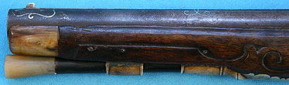 A fine German dueling pistol, numbered on the tang as two of a pair, by Johann Andreas Kuchenreiter I 30