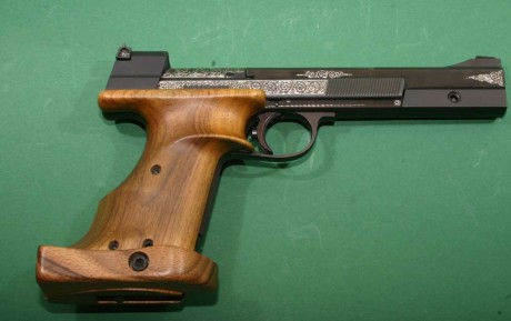 Hola

 Alguien sabe que puede costar hacer alguna firigrana  a una pistola deportiva para que pueda alegarse 30