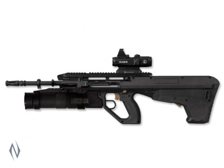 Le llaman: Steyr AUG EF88

Parece pensado para disparar mas de un calibre, y especialmente modificada 00