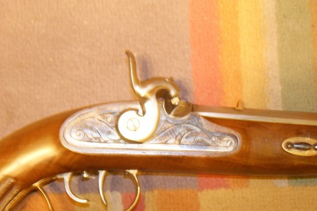 Me gustaria me ayudaseis a identificar que modelo de replica es esta pistola. He encontrado alguna foto 11