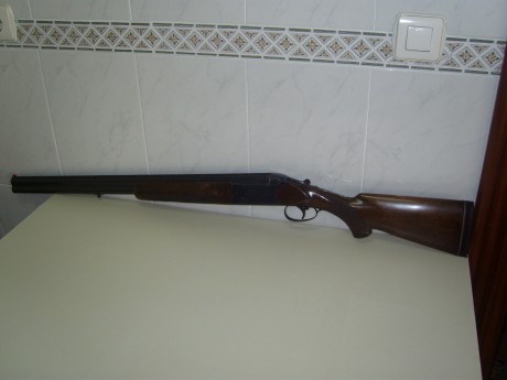 Me han regalado una escopeta, y en la guia pone marca SUHL, pero me temo que esa no es la marca. En ningún 21