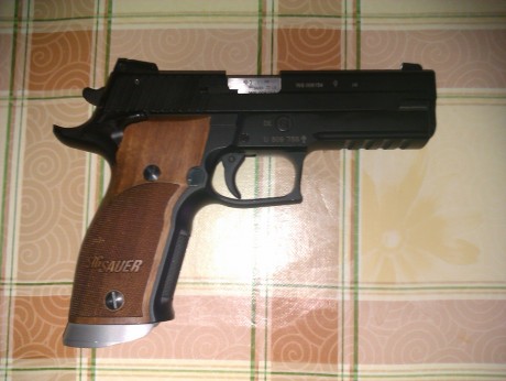 Hola compañeros, después de estar casi covencido por la Sig P226 X-Five, ahora me toca decidirme entre 52