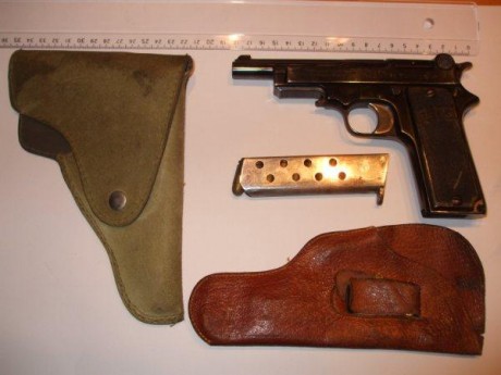 He oido hablar mucho de esta pistola pero nunca he visto ninguna.

¿ Podéis alguno aportar fotos y características 20