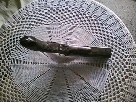 Me Interesaria saber si alguien conoce el modelo de este mosquetón de doble cañon
ya que lo unico que 00