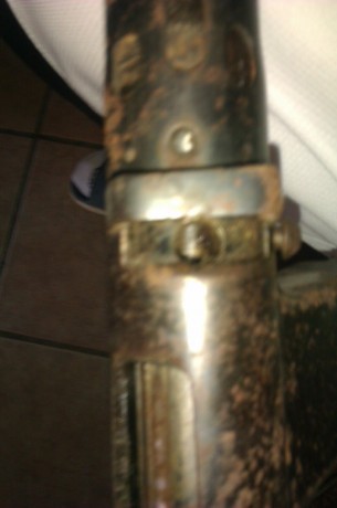 Hola a todos,hace muxos anos le dieron a mi madre para kolggar en una kocina rustica un arma,q parece 100