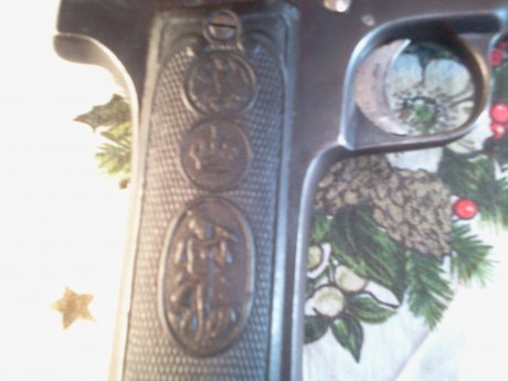 Buenas compañeros, necesito identificar la marca de esta pistola que herede, saludos!  :metra: 01