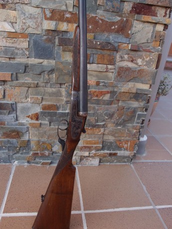 mi padre tiene una paralela con pletina entera que en un cañon pone fabrica de gaspar arizaga-eibar(españa).los 32