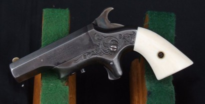 Hola, otra peque . . .
texto
Southerner .41 RF Single Shot Deringer, with patent address for Merimack 00