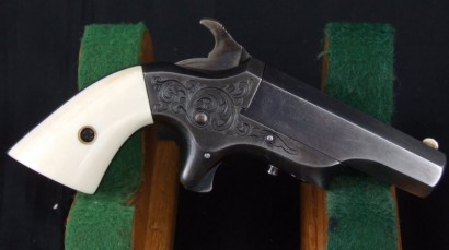 Hola, otra peque . . .
texto
Southerner .41 RF Single Shot Deringer, with patent address for Merimack 12