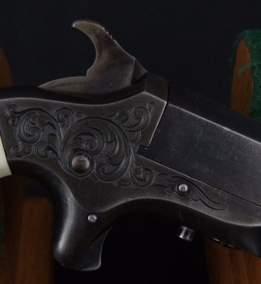 Hola, otra peque . . .
texto
Southerner .41 RF Single Shot Deringer, with patent address for Merimack 21