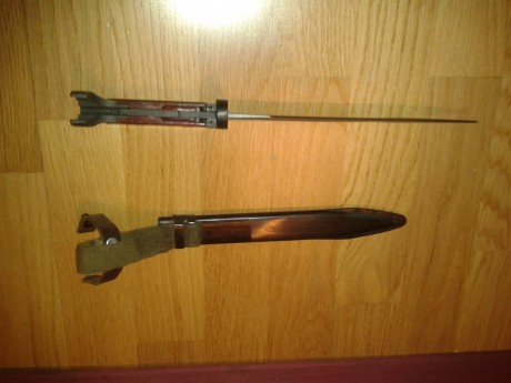 Hola. Alguien podria darme informacion sobre esta bayoneta? A que arma pertenece y pais. No lleva ningun 01