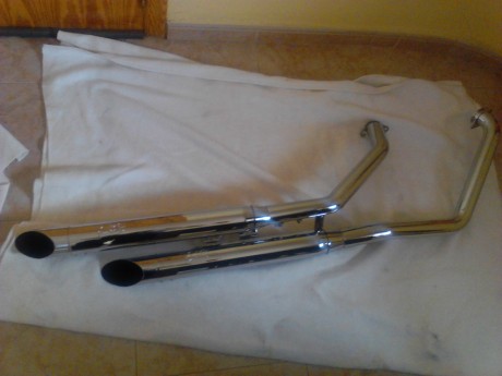 hola vendo escapes silvertrail ko2 homologados con kit racin,defensas limbar custom de una pieza,llanta 12