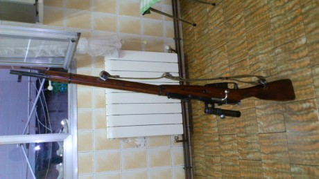 El Mosin-Nagant ..
es un rifle militar accionado por cerrojo, con cargador de cinco proyectiles, que 92