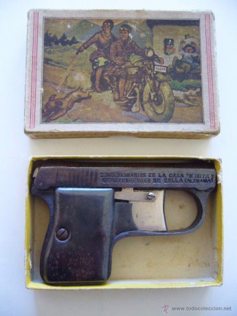 Me han ofrecido una pistola, parece ser que detonadora, y desconozco que pistola es. Lamento no poder 30