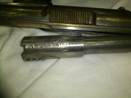 Hola,acabo de adquirir una astra 400 en la subasta de mi zona y tengo una duda,esta pistola no tiene ningun 11