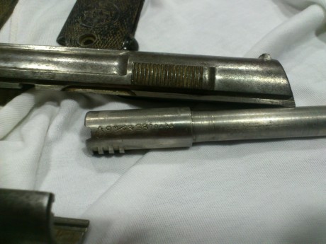 Hola,acabo de adquirir una astra 400 en la subasta de mi zona y tengo una duda,esta pistola no tiene ningun 10