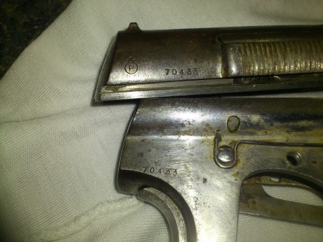 Hola,acabo de adquirir una astra 400 en la subasta de mi zona y tengo una duda,esta pistola no tiene ningun 31