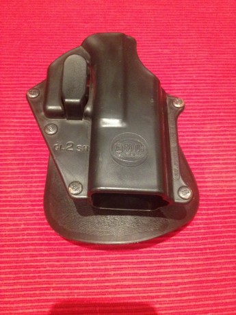 Se VENDE magnifica funda FOBUS para Glock 19/23, fabricada en polímero de alta resistencia.
La funda se 00