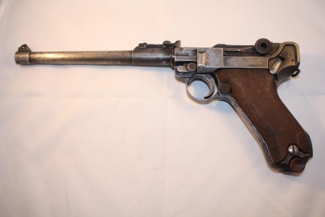 Hola a todos, soy nuevo en él foro y me gustaría que algún experto opinase sobre la luger que tengo en 60