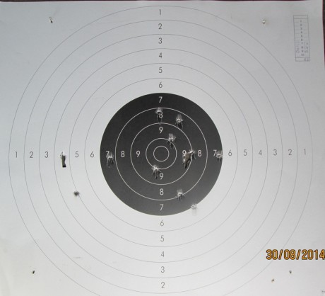 Esta mañana he estado tirando con la pistola (rochatte)  a una diana reciclada los trece tiros de rigor 00