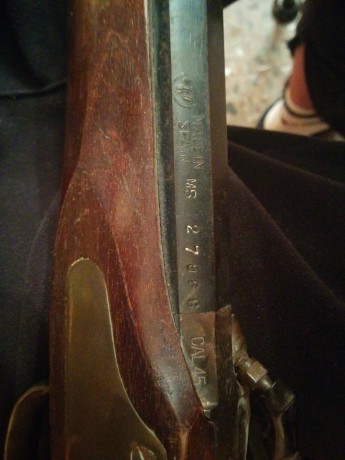 Buenas a todos, poseo una reproducción de un rifle que me gustaría conocer su marca, antigüedad y valor 00