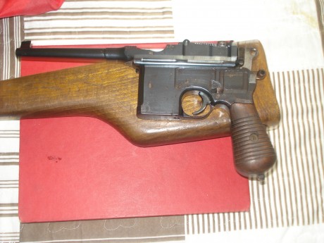 hola,cambio esta pistola mm-31 con su funda culatin original,inutilizada solo taponada la recamara,certificado 01