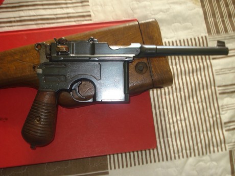 hola,cambio esta pistola mm-31 con su funda culatin original,inutilizada solo taponada la recamara,certificado 00