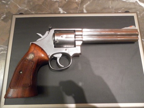 cambio revolver smiht wesson modelo 686 de 6"  , por otro del mismo modelo pero de 4" , tambien 00