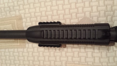 Escopeta de corredera 12/76 recamara magnum, con acabado parkerizado anticorrosion, cargador de 8+1,sin 20