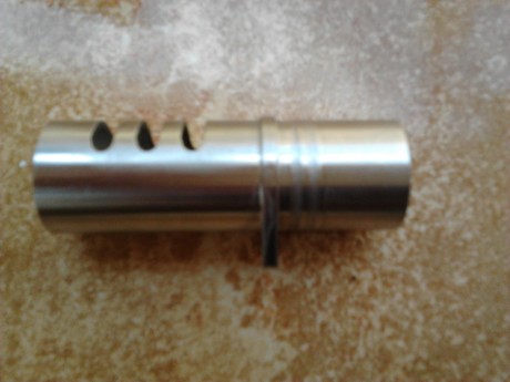 cambio cachas 1911 por cargadores 1911 de 8 o 10 cartuchos del calibre 45 acp. o vendo
 2014-10-10 15.21.02.jpg 00