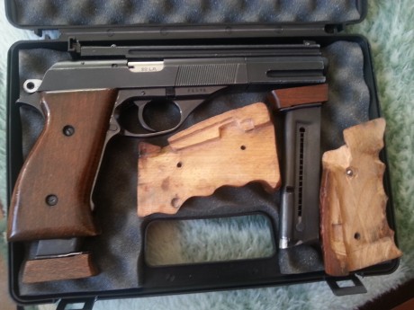 Vendo pistola astra ts 22 cachas originales y anatómicas dos cargadores maletín y munición 639824255. 00