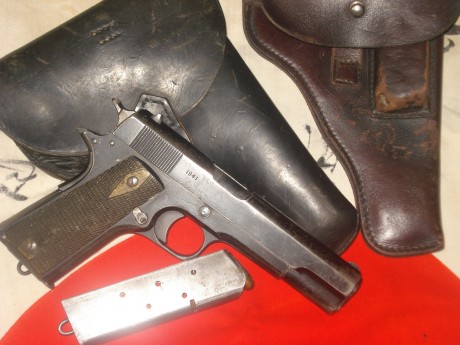 hola vendo esta magnifica pieza de coleccion,una colt konsgberg 1914,copia noruega de la colt 1911,de 01