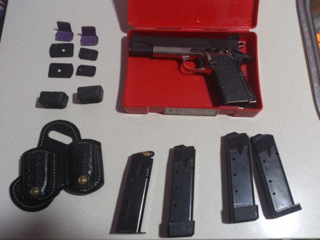 Hola, vendo o cambio estas armas las dos juntas o separadas, se trata de una smith and wesson mod 910 01