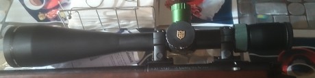 Nikko Stirling Diamond 10-50X60. Funcionando perfectamente. Con una marcas en la zona de la campana que 01