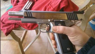 pues lo dicho vendo mi pistola paraordenance edicion limited en 9 mm del 2012 con pocos tiros,con miras 11