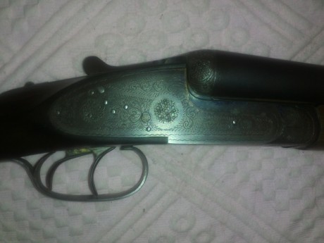 Buenas , vendo una escopeta paralela marca LIG ,guiada en E , calibre 12/70, expulsora , pletina larga 01