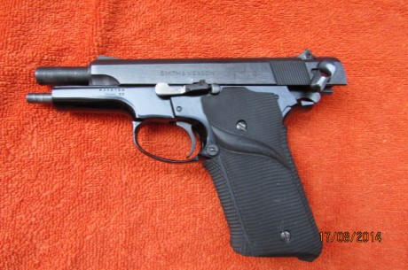 Vendo pistola S&W modelo 59 del cal 9m para. urge por necesitar hueco. esta en perfecto estado. precio 00