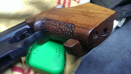 Vendo pistola Hammerli 280 calibre 32 con un cargador y el recogevainas la pistola está en perfectas condiciones 61