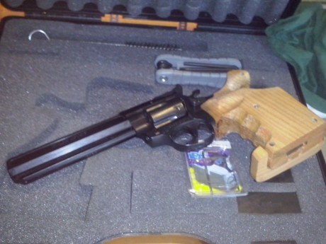 por cambio vendo mi revolver del 32 un revolver muy querido con cañon s & W LONG MUY CUIDADA CON DOS 00